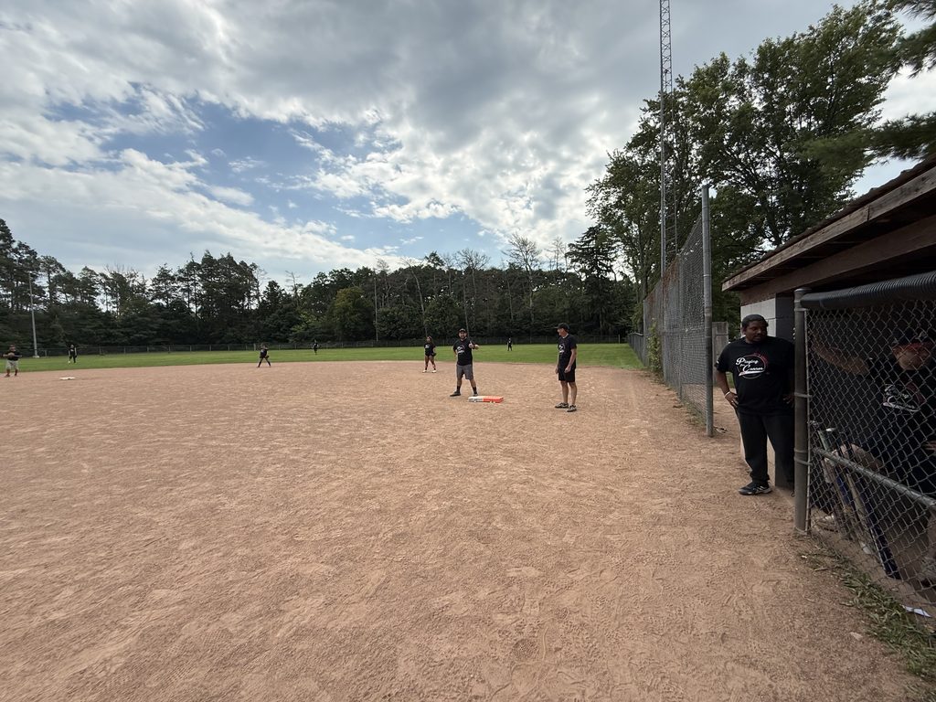 People in a baseball diamond. 