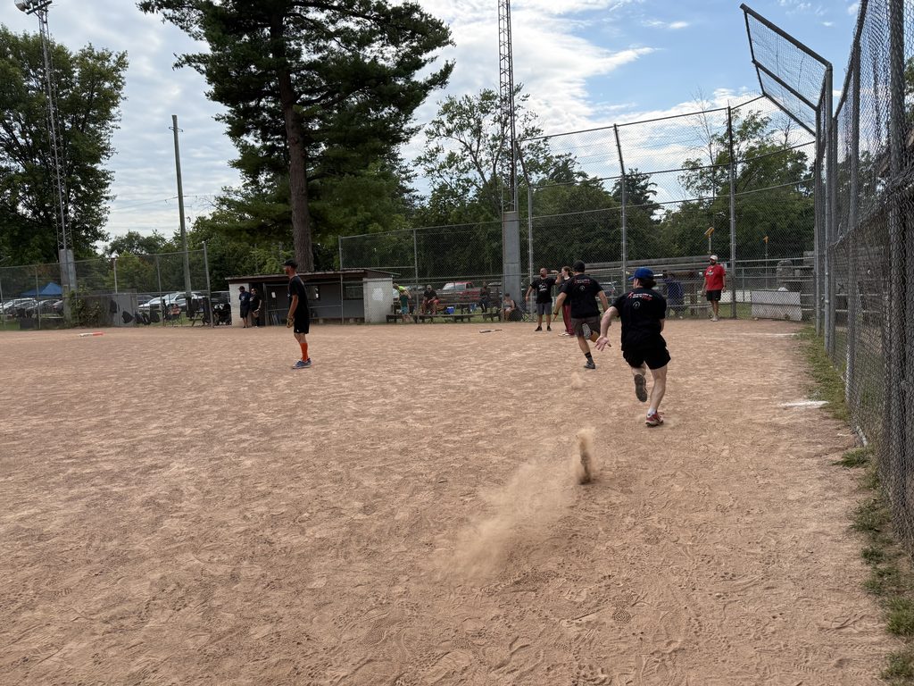 People running to home plate. 